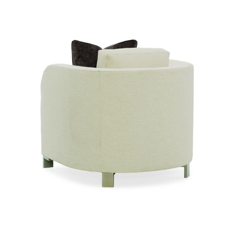 This stylish chair is low and modern with curvy appeal. Fully upholstered in a textured