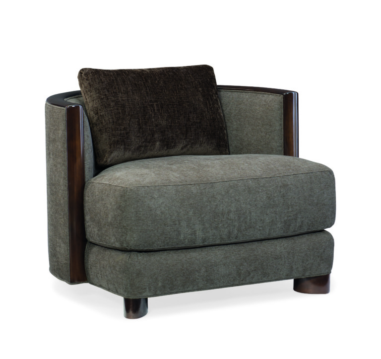 The Commodore Chair is a true barrel chair with a commanding presence. Distinguished by its low back