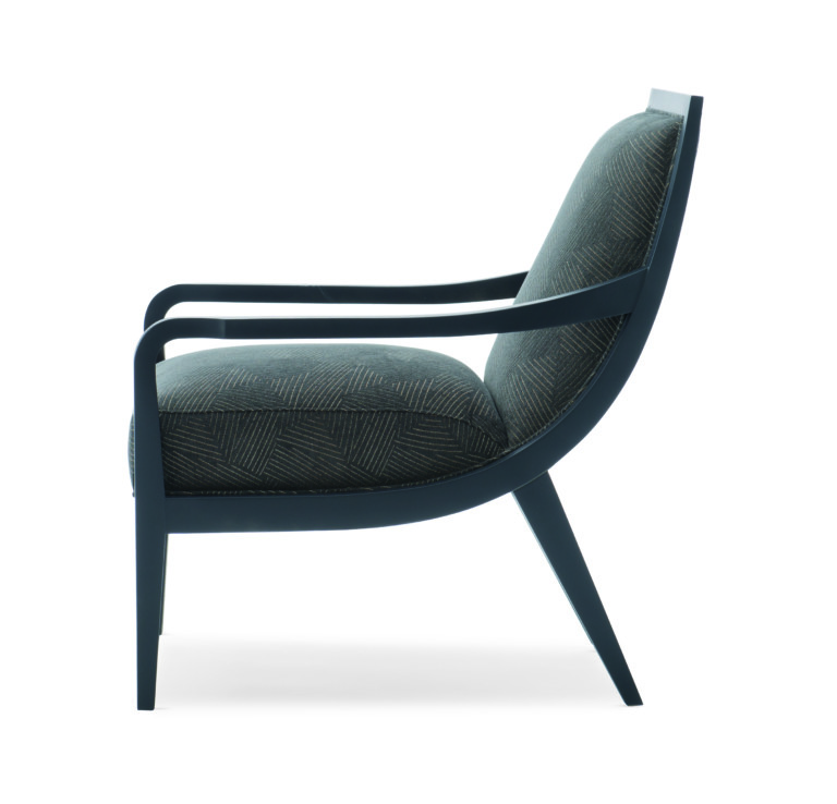 Welcome home to the essence of modern minimalism. Its elegant silhouette is complemented by a cross-hatch chenille fabric in a rich shade of charcoal with platinum accents. An Iron Ore finish creates the framework and accentuates the sensuous curves of this contemporary beauty.